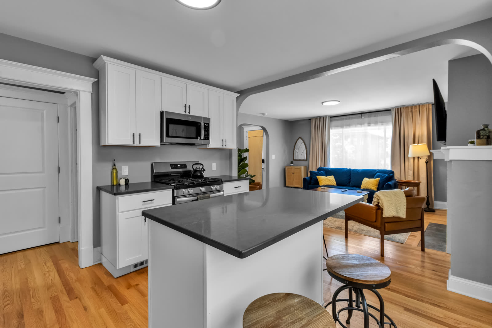 Furnished kitchen and living room in a home run by 716 Corporate Housing in Buffalo, NY